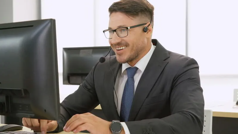Recruiting team reviewing screener documents at a conference table