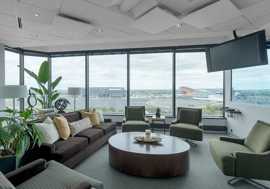 Stadium Suite discussion seating beside the panoramic windows